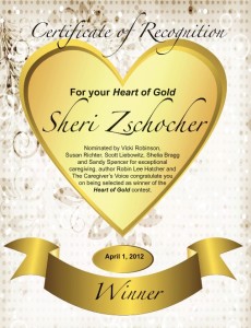 Sheri Zschocher receives the Heart of Gold Certificate 
